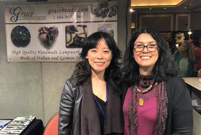 Grace Ma of Grace Lampwork Beads and Artbeads Chief Jewelry Designer Cynthia Kimura at the 2018 Tucson Gem and Mineral Show