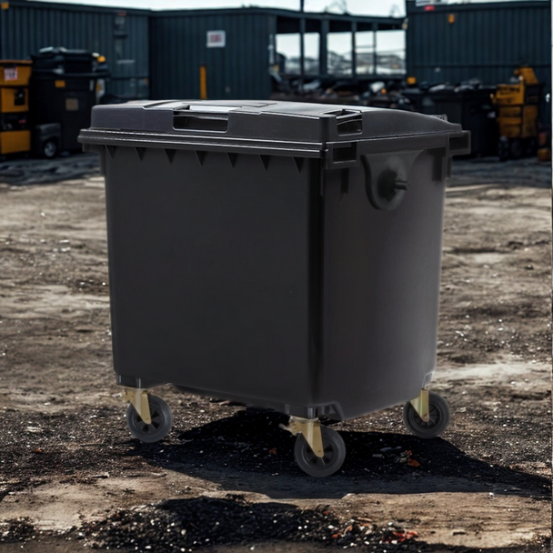 Black 1100 Litre Wheelie Bin in the Yard of a Commercial Facility