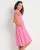 Side view of Jude Connally Tess Pink Geo Link Sleeveless Midi Dress 
