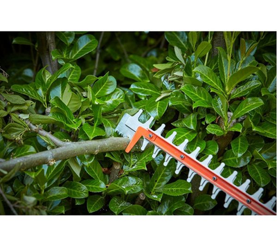 Black + Decker 650W 60cm Twist Handle Hedge Trimmer with Sawblade