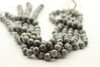 Map Jasper, Natural, Faceted Round, 10mm Strand