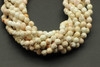 Magnesite, Natural, Faceted Round, 4mm Strand