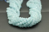 Aquamarine, Heated, Faceted Round. 6mm Strand