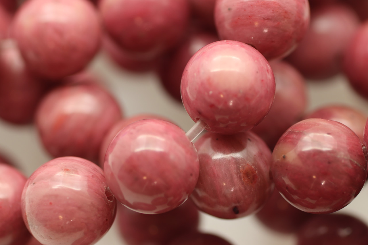 Rhodonite, Pink, Smooth Round in sizes 6mm & 8mm. Priced Per Strand