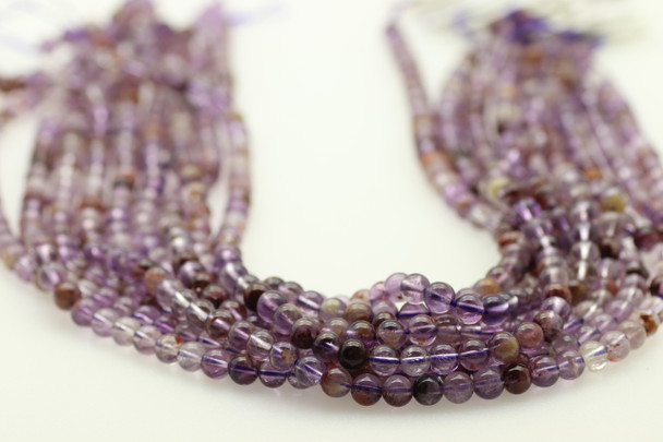 Super 7, Melody Stone, Purple, Natural, Smooth Round in sizes 4mm, 6mm, 8mm & 10mm. Priced Per Strand
