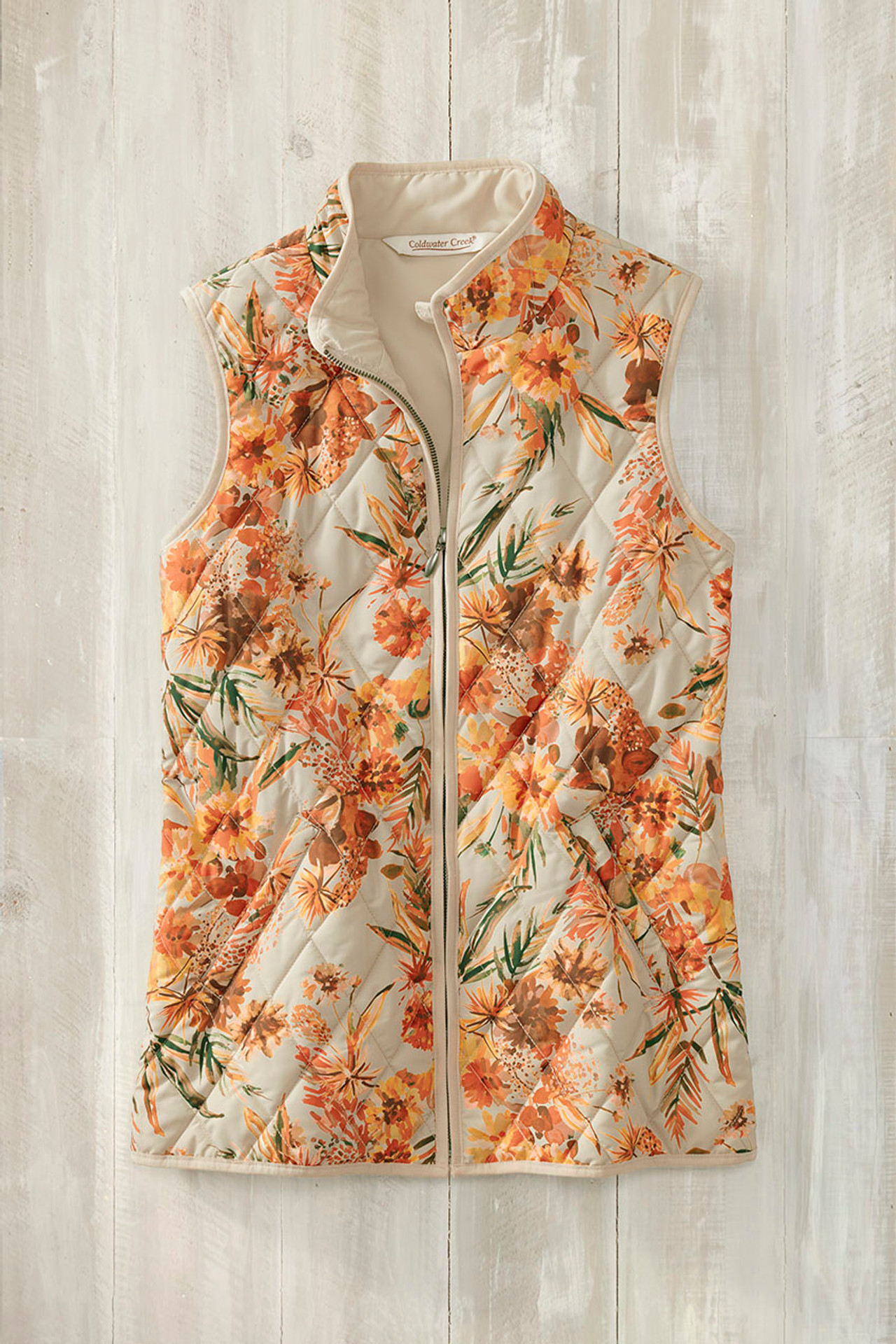 https://cdn11.bigcommerce.com/s-lulfv0vz2b/images/stencil/1280w/products/12781/81511/woodland-florals-vest-for-all-seasons__stone-multi_0__95806__73812.1705067049.jpg?c=1