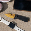 SOG Knives Ultra XR Gold - Ultralight EDC Knife - 2.8" S35VN Gold TiNi Blade, Carbon Fiber Handles, Titanium Money Clip