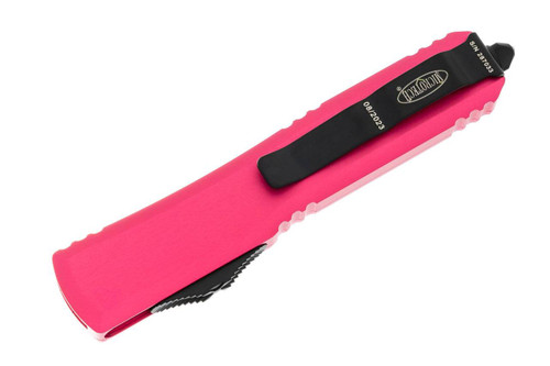 Microtech 121-2PK Ultratech AUTO OTF - 3.46" Black Drop Point Combo Blade, Pink Aluminum Handles Microtech 121-2PK Ultratech AUTO OTF - 3.46" Black Drop Point Combo Blade, Pink Aluminum Handles