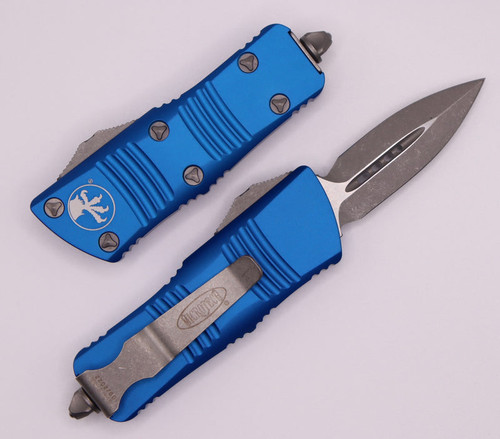 Microtech 238-10APBL Mini Troodon OTF AUTO - Knife 1.99" Apocalyptic Double Edge Dagger Blade, Blue Aluminum Handles Microtech 238-10APBL Mini Troodon OTF AUTO - Knife 1.99" Apocalyptic Double Edge Dagger Blade, Blue Aluminum Handles