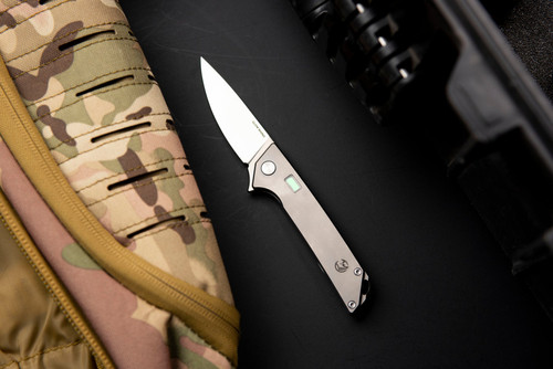 Glow Rhino Reactor Framelock Knife - 2.9" Satin S35VN Blade, Gray Titanium Handle with Tritium Inserts Glow Rhino Reactor Framelock Knife - 2.9" Satin S35VN Blade, Gray Titanium Handle with Tritium Inserts
