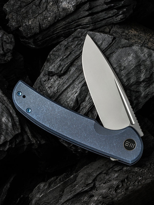 We Knife Beacon Flipper Knife - 3.48" CPM-20CV Bead Blasted Drop Point Blade, Blue Titanium Handles We Knife Beacon Flipper Knife - 3.48" CPM-20CV Bead Blasted Drop Point Blade, Blue Titanium Handles