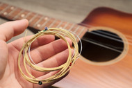 Exploring The Impact of Different Materials on Guitar String Tone