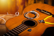 Instructions on Changing the Strings on an Acoustic Guitar