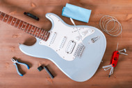 How to string a guitar for each of the major guitar types