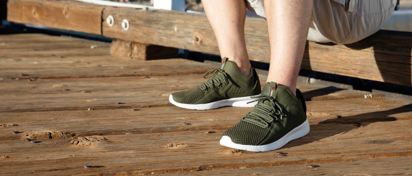 a man wearing alpine swiss casual sneakers