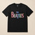 The Beatles Unisex T-Shirt: Floral Logo (Black)