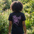 Prince Unisex Carbon T-Shirt: Purple Rain Logo Outline (Black) (Back Print)