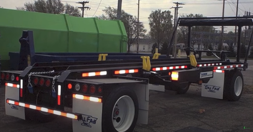 Tie down system for a pup trailer. 