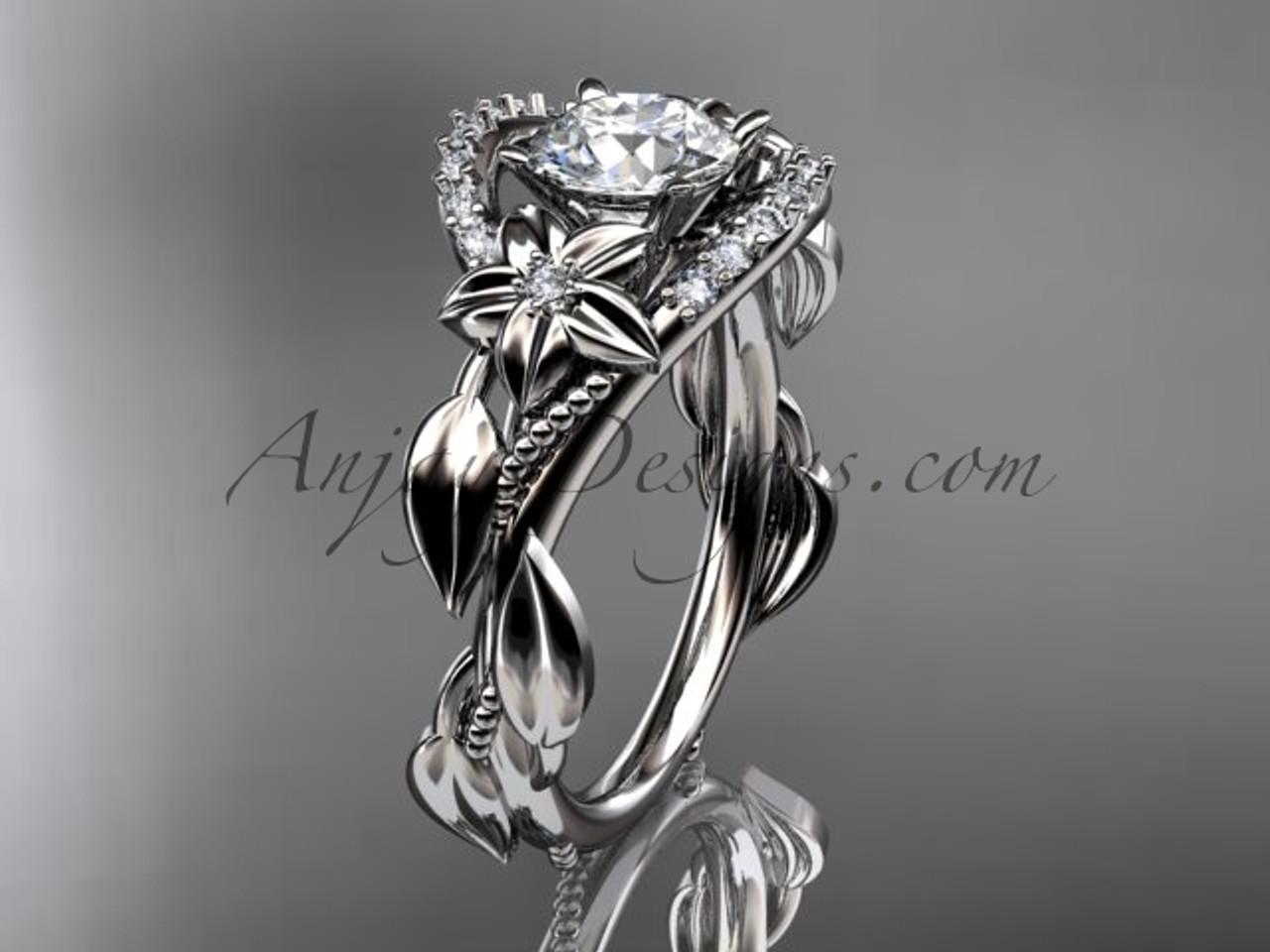 Platinum Round Brilliant Diamond Adorned Claws and Secret Halo Solitai –  RockHer.com