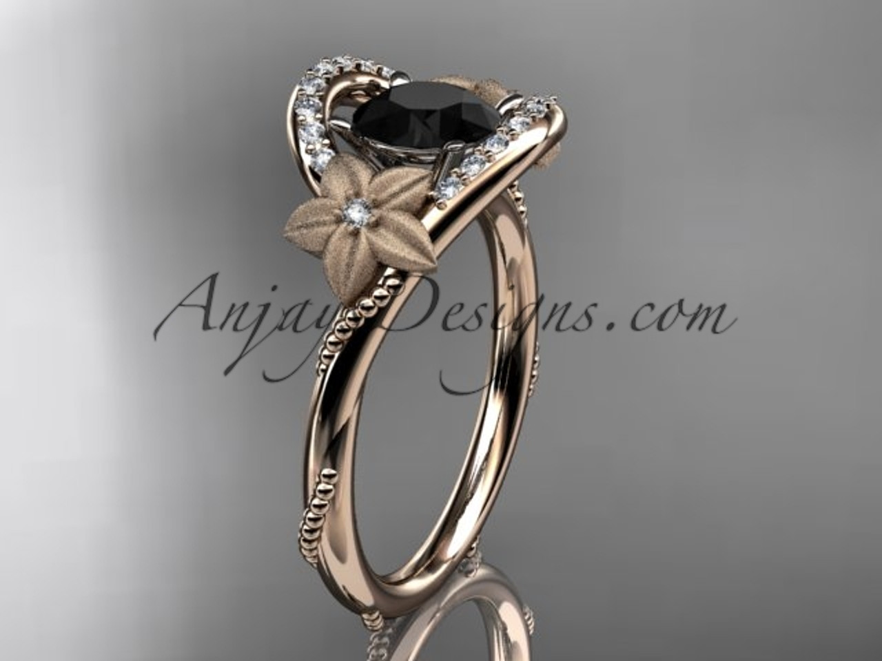 14kt rose gold diamond unique engagement ring with a Black Diamond center  stone ADLR166