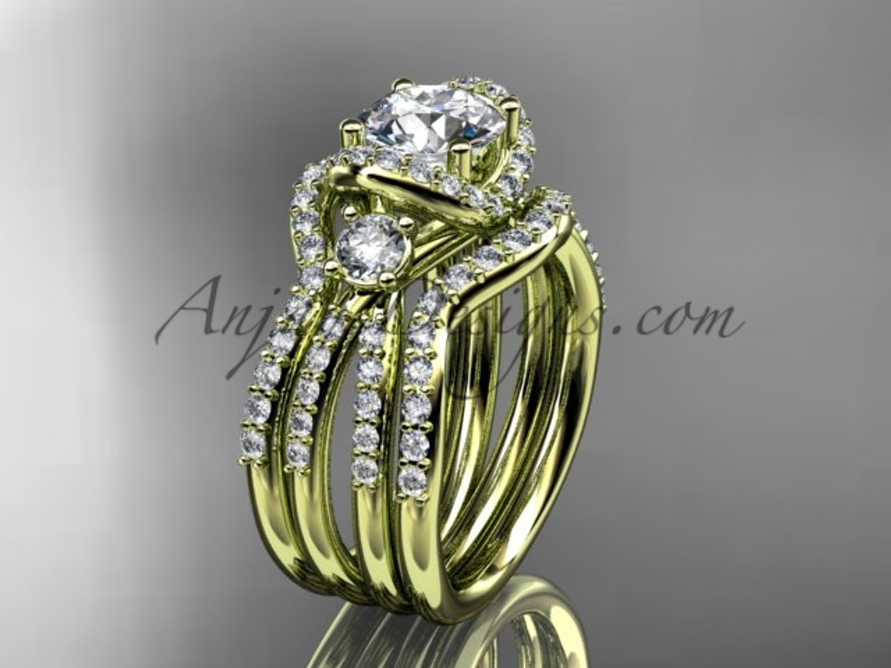 https://cdn11.bigcommerce.com/s-lv8wwzzpu5/images/stencil/1280x1280/products/8532/61689/leafring146_yellow_gold_diamond_wedding_ring_diamond_engagement_ring_forever_brilliant_moissanite_matching_band_set_1__30628.1516376791.jpg?c=2