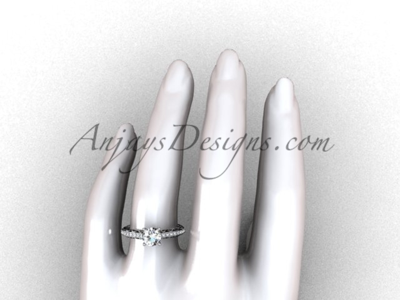 JOINED AT THE HEART designer engagement ring features a pear-shaped center  stone designer wedding set is set with clear simulated diamonds in sterling  silver bonded with platinum - Diamond & Design