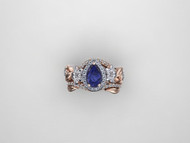 Blue Sapphire Center Stone And Rose Gold Celtic Engagement  Ring