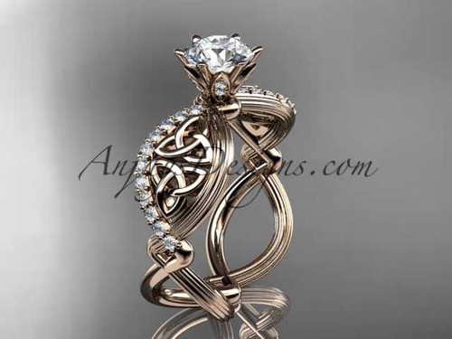 14kt rose gold diamond celtic trinity knot wedding ring, engagement ring with a "Forever One" Moissanite center stone CT7192 14kt rose gold diamond celtic trinity knot wedding ring, engagement ring with a "Forever One" Moissanite center stone CT7192