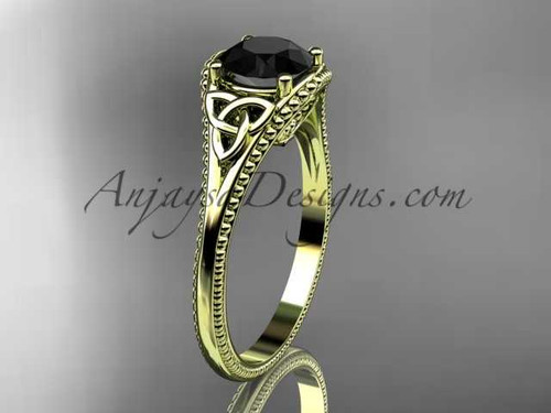 14kt yellow gold celtic trinity knot wedding ring, engagement ring with a Black Diamond center stone CT7375