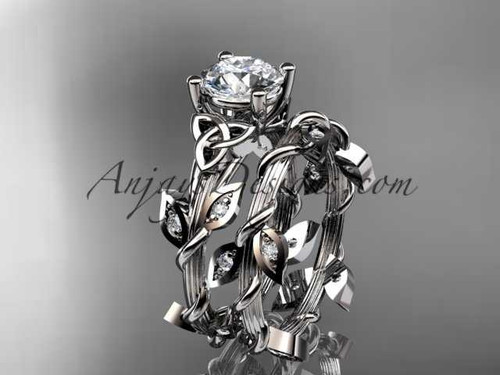 14kt white gold diamond celtic trinity knot wedding ring, engagement ring with a "Forever One" Moissanite center stone CT7215S