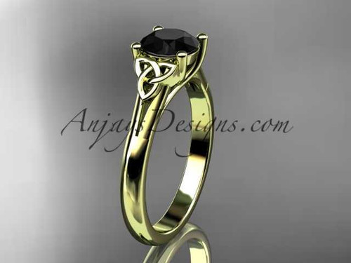 14kt yellow gold celtic trinity knot wedding ring with a Black Diamond center stone CT7154