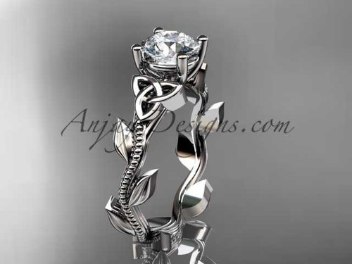 14kt white gold celtic trinity knot wedding ring, engagement ring with a "Forever One" Moissanite center stone CT7238