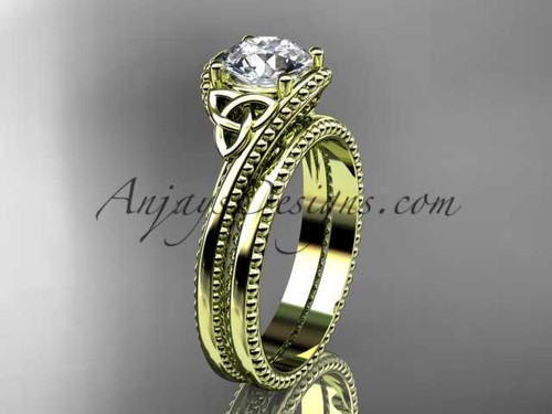14kt yellow gold celtic trinity knot wedding ring, engagement set with a "Forever One" Moissanite center stone CT7322S