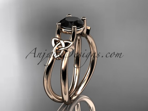 14kt rose gold celtic trinity knot wedding ring, engagement ring with a Black Diamond center stone CT7130