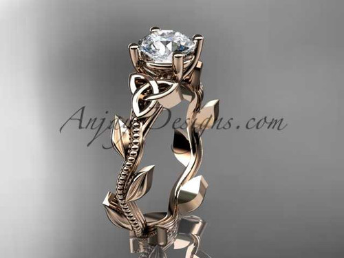 14kt rose gold celtic trinity knot wedding ring, engagement ring with a "Forever One" Moissanite center stone CT7238