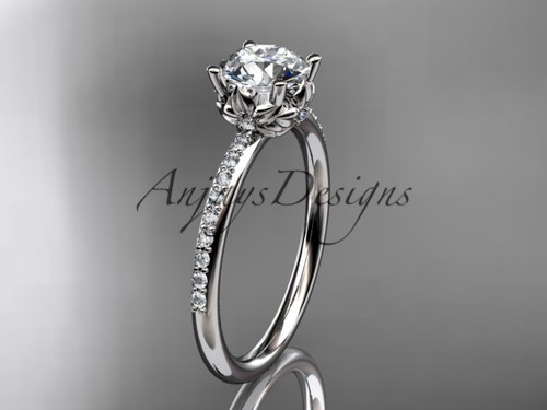 Delicate dainty flower engagement ring featuring 1 carat round lab grown diamond with minimalist nature inspired design in 14k white gold by Anjays Designs.