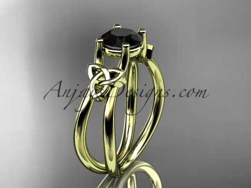 14kt yellow gold celtic trinity knot wedding ring, engagement ring with a Black Diamond center stone CT7130