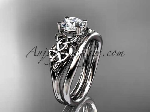 platinum celtic trinity knot wedding ring, engagement set with a "Forever One" Moissanite center stone CT7169S