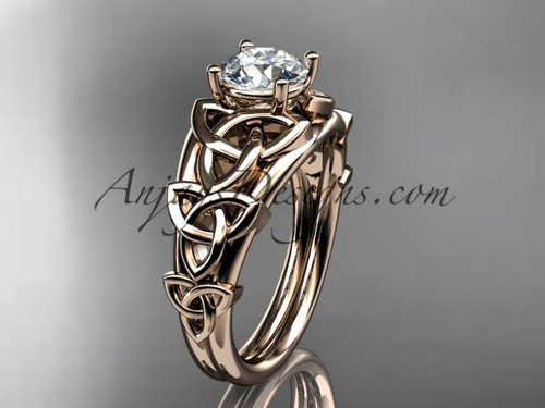 14kt rose gold celtic trinity knot engagement ring , wedding ring  with a "Forever One" Moissanite center stone CT765