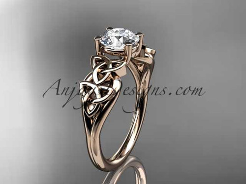 14kt rose gold celtic trinity knot wedding ring, engagement ring with a "Forever One" Moissanite center stone CT7169