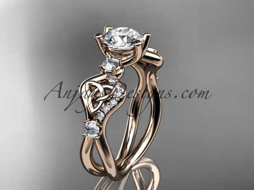 14kt rose gold celtic trinity knot engagement ring, wedding ring with a "Forever One" Moissanite center stone CT768