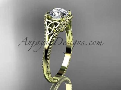 14kt yellow gold celtic trinity knot wedding ring, engagement ring with a "Forever One" Moissanite center stone CT7375 14kt yellow gold celtic trinity knot wedding ring, engagement ring with a "Forever One" Moissanite center stone CT7375