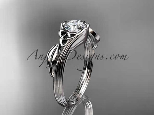 14kt white gold celtic trinity knot wedding ring, engagement ring with a "Forever One" Moissanite center stone CT7324 14kt white gold celtic trinity knot wedding ring, engagement ring with a "Forever One" Moissanite center stone CT7324