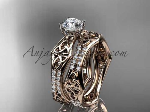 14kt rose gold diamond celtic trinity ring, triquetra ring, engagement set with a "Forever One" Moissanite center stone CT7353S