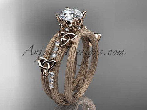 14kt rose gold diamond celtic trinity knot wedding ring, engagement ring with a "Forever One" Moissanite center stone CT7329 14kt rose gold diamond celtic trinity knot wedding ring, engagement ring with a "Forever One" Moissanite center stone CT7329