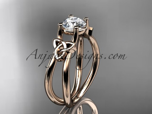 14kt rose gold celtic trinity knot wedding ring, engagement ring with a "Forever One" Moissanite center stone CT7130