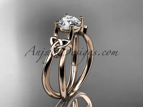 14kt rose gold celtic trinity knot wedding ring, engagement ring with a "Forever One" Moissanite center stone CT7130