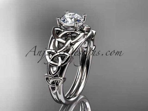 14kt white gold celtic trinity knot engagement ring , wedding ring with a "Forever One" Moissanite center stone CT765