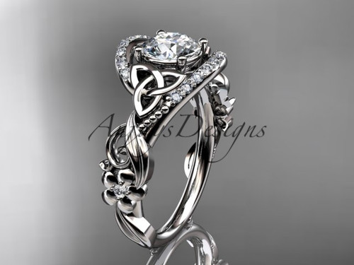 Elegant Celtic trinity knot engagement ring featuring IGI certified 1 carat diamond with nature inspired details in 14k white gold by Anjays Designs.