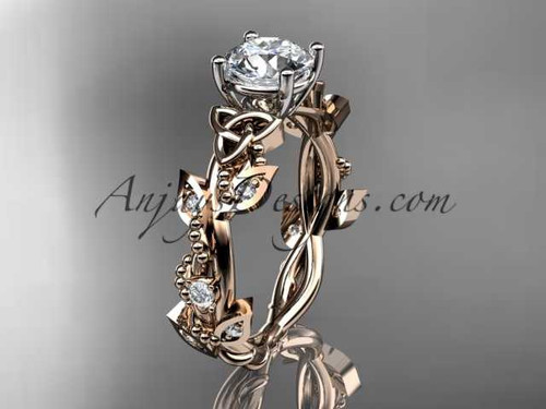14kt rose gold celtic trinity knot engagement ring, wedding ring with a "Forever One" Moissanite center stone CT759
